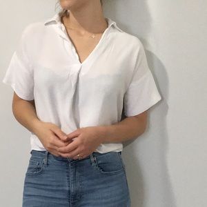 M white top with buttons